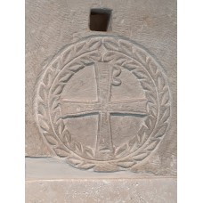 Limestone funerary stele, cross with wreath